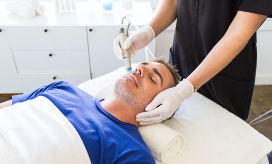 Man Receiving A Hydra Facial In Gainesville, FL