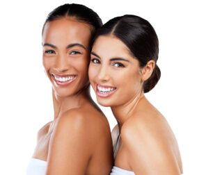 Two woman smiling