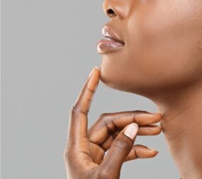 African American Woman touching her chin