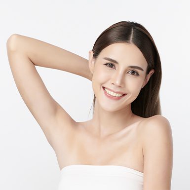 Woman holding arm above her head