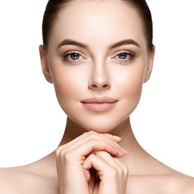 Woman holding her hands under her chin